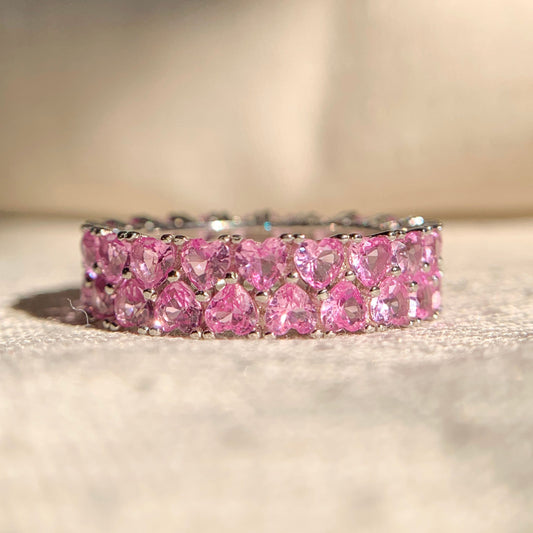 “Pink heart double row diamond band in 14k rose gold for elegant everyday wear”