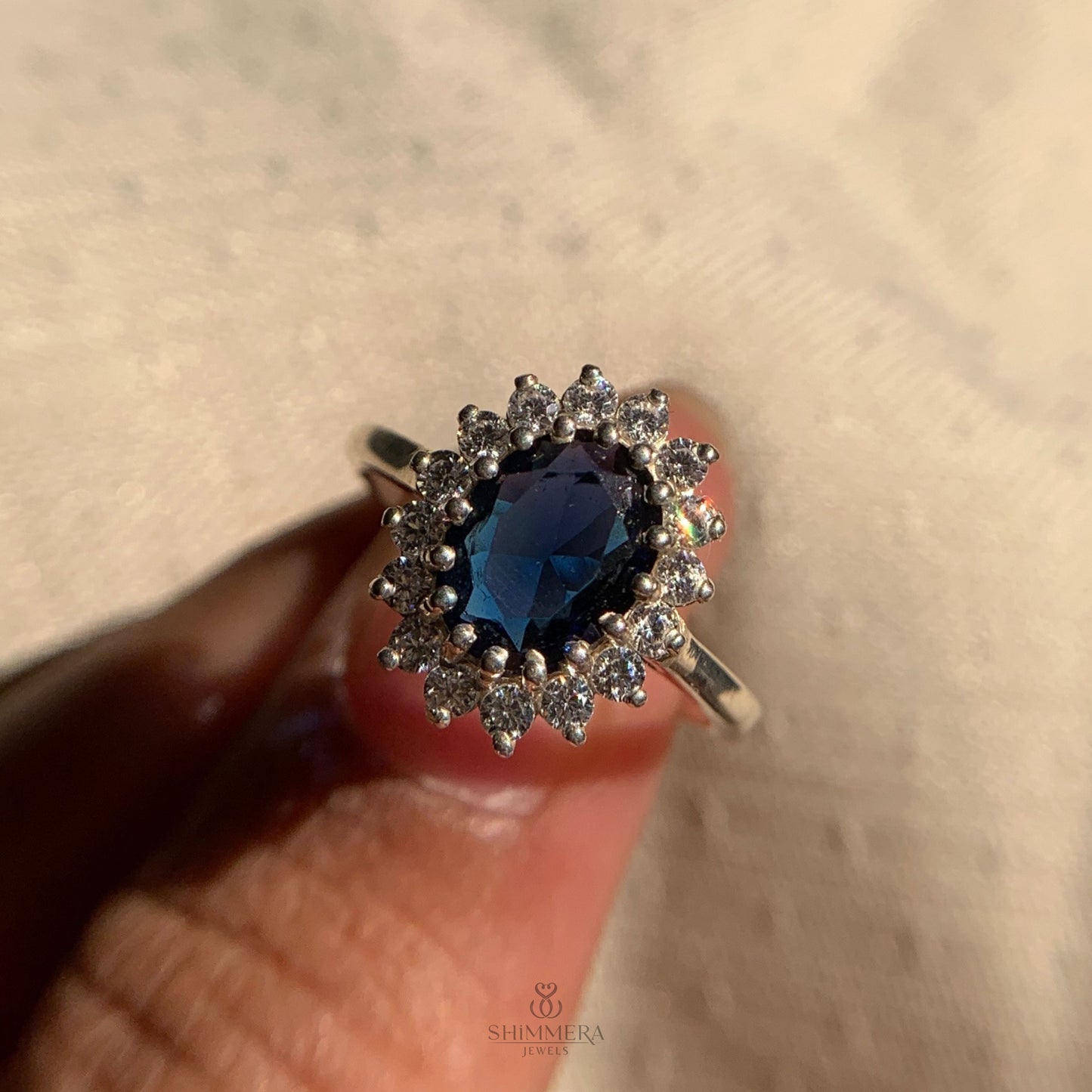 Luxury oval sapphire and diamond engagement ring for women