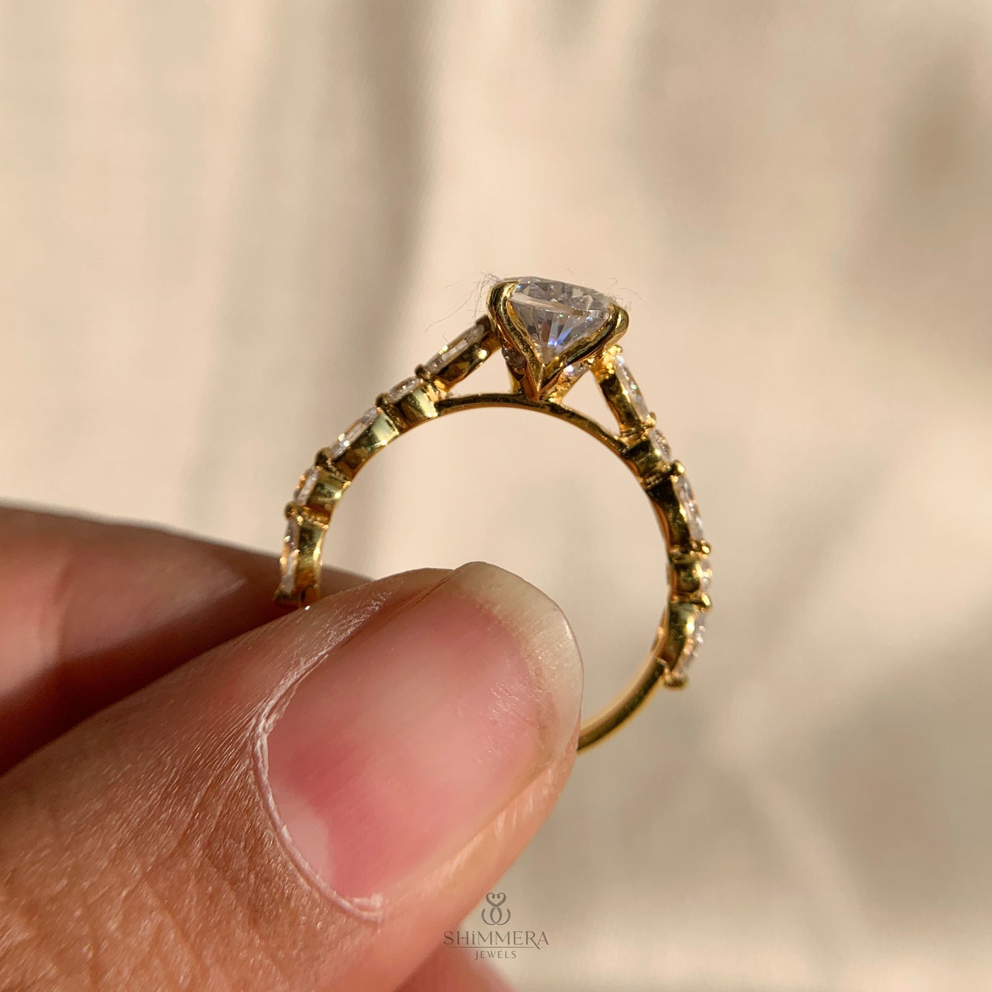Pear Shaped Diamond Engagement Ring With Marquise Side Accents
