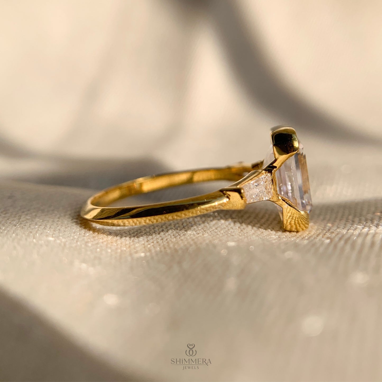Three Stone Emerald Cut Diamond Ring