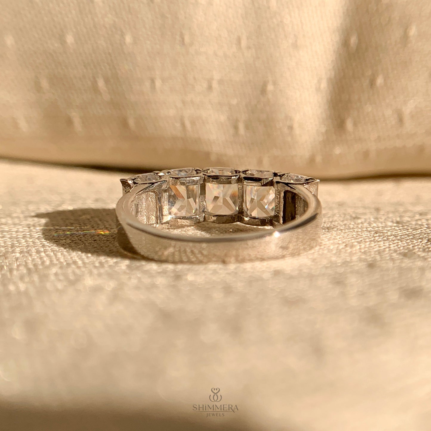 "Emerald cut scalloped half eternity band for engagement or anniversary"