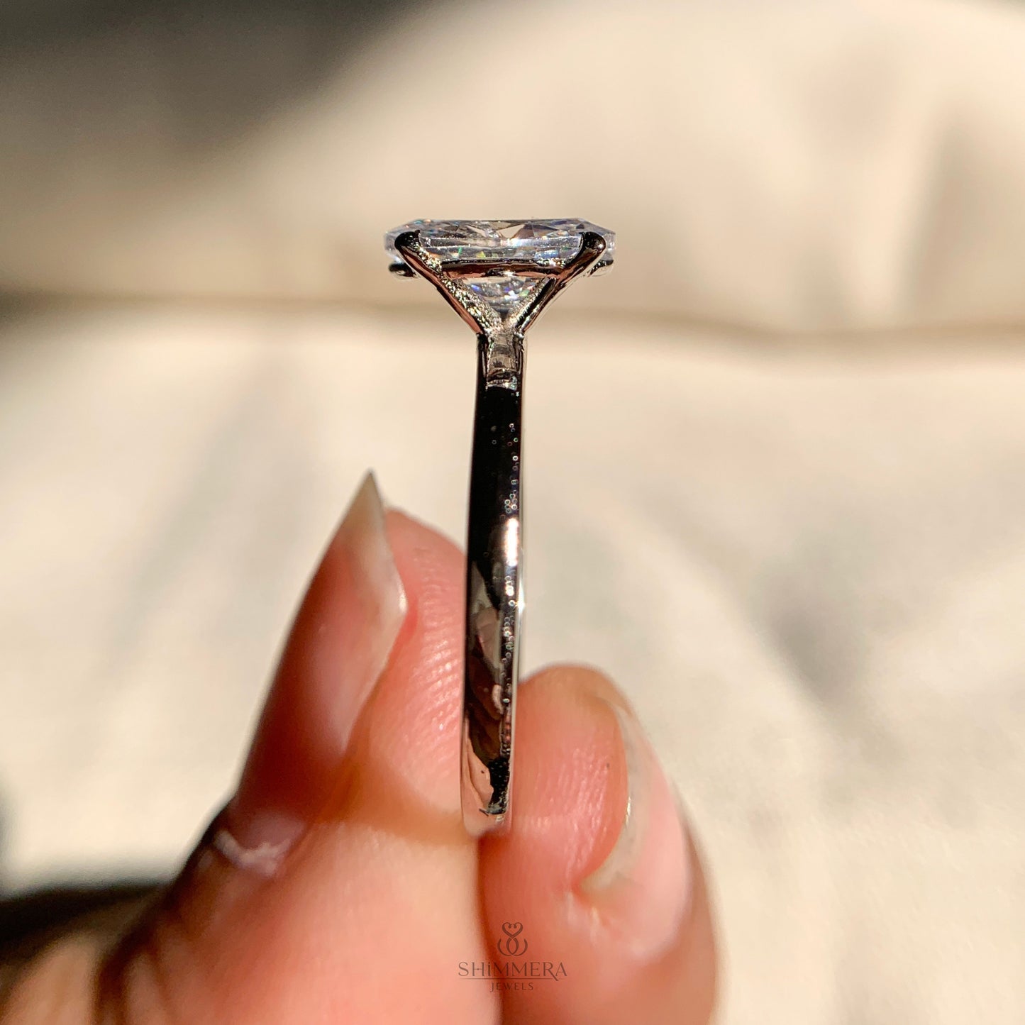 Modern 1 carat oval solitaire engagement ring in sterling silver band