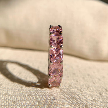 Sterling silver eternity band with pink princess cut diamonds – timeless bridal jewelry