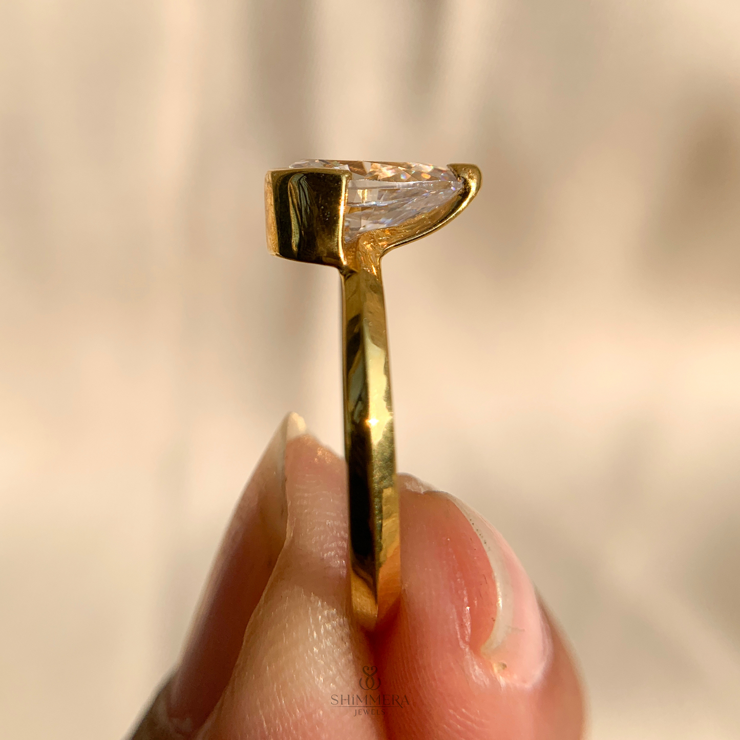 Half Bezel Pear Diamond Ring