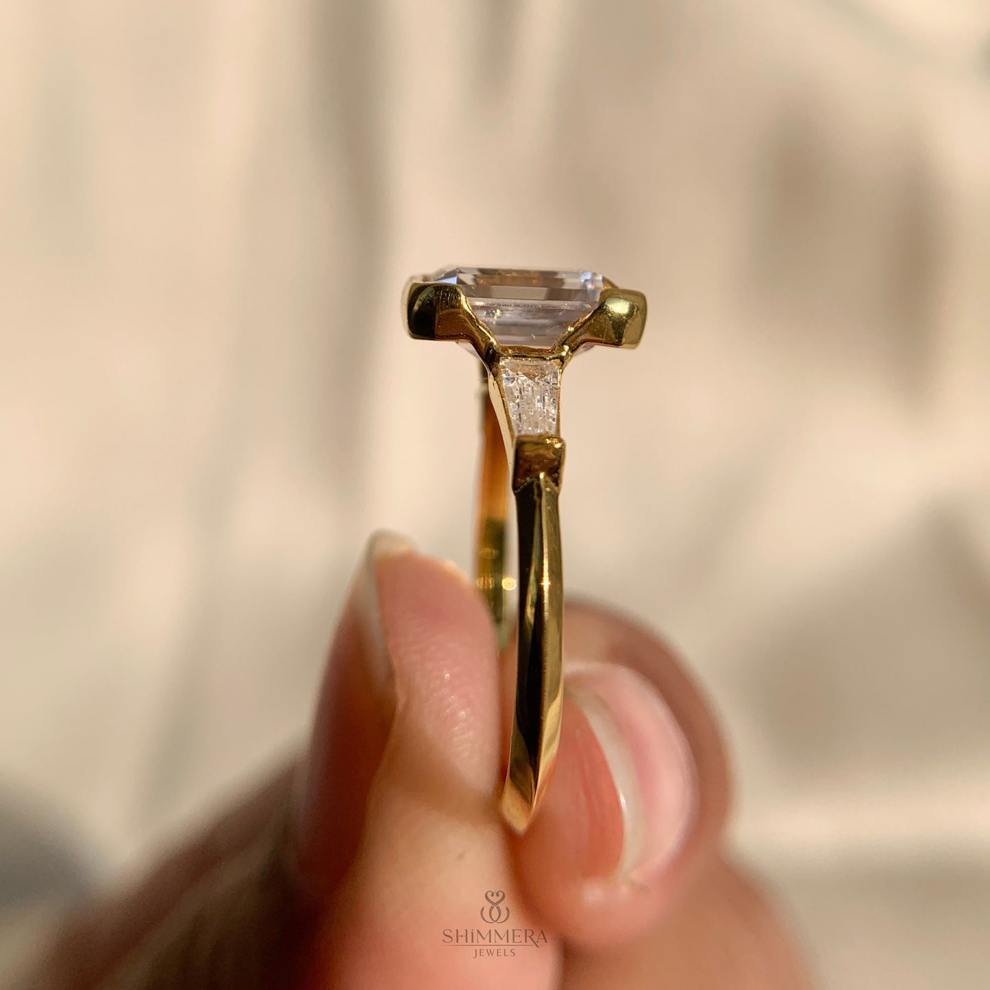 Three Stone Emerald Cut Diamond Ring