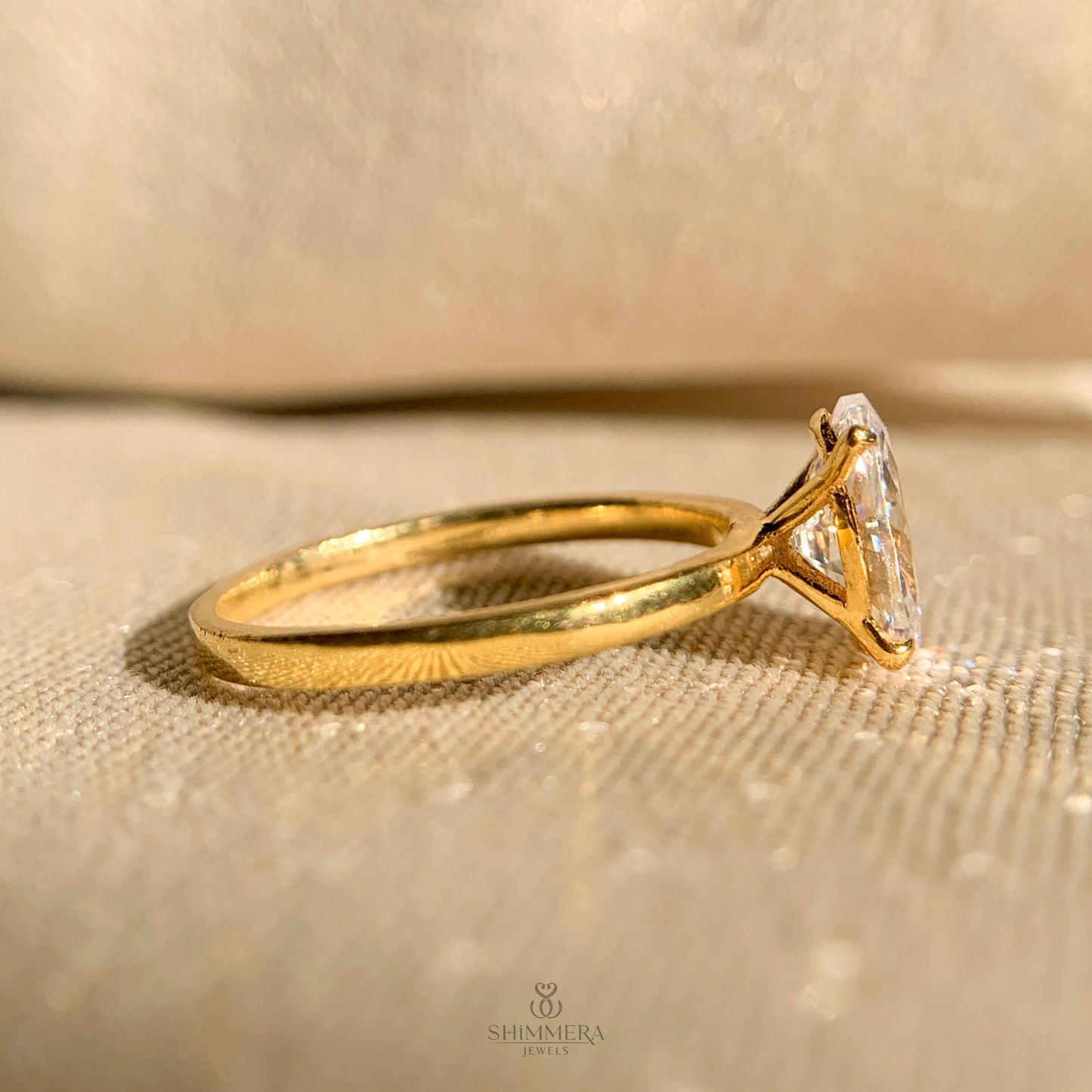 Simple oval cut solitaire engagement ring with sleek band