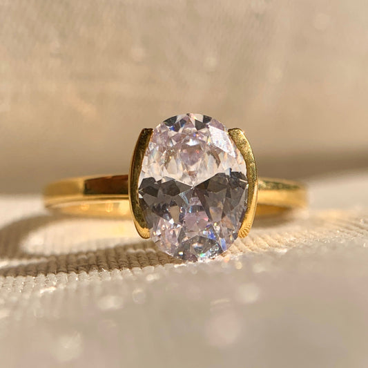 Oval Cut Diamond Half Bezel Set Ring