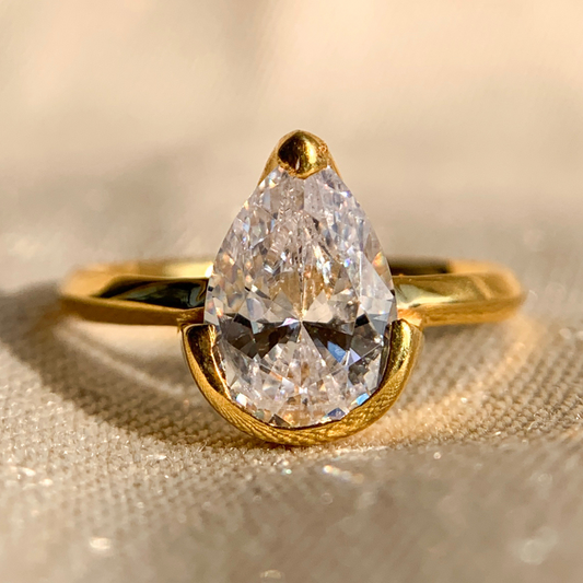 Half Bezel Pear Diamond Ring