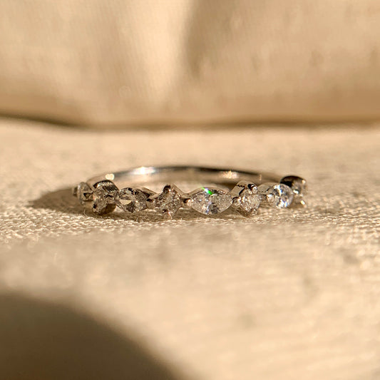 Horizontal marquise and round diamond ring in white gold setting