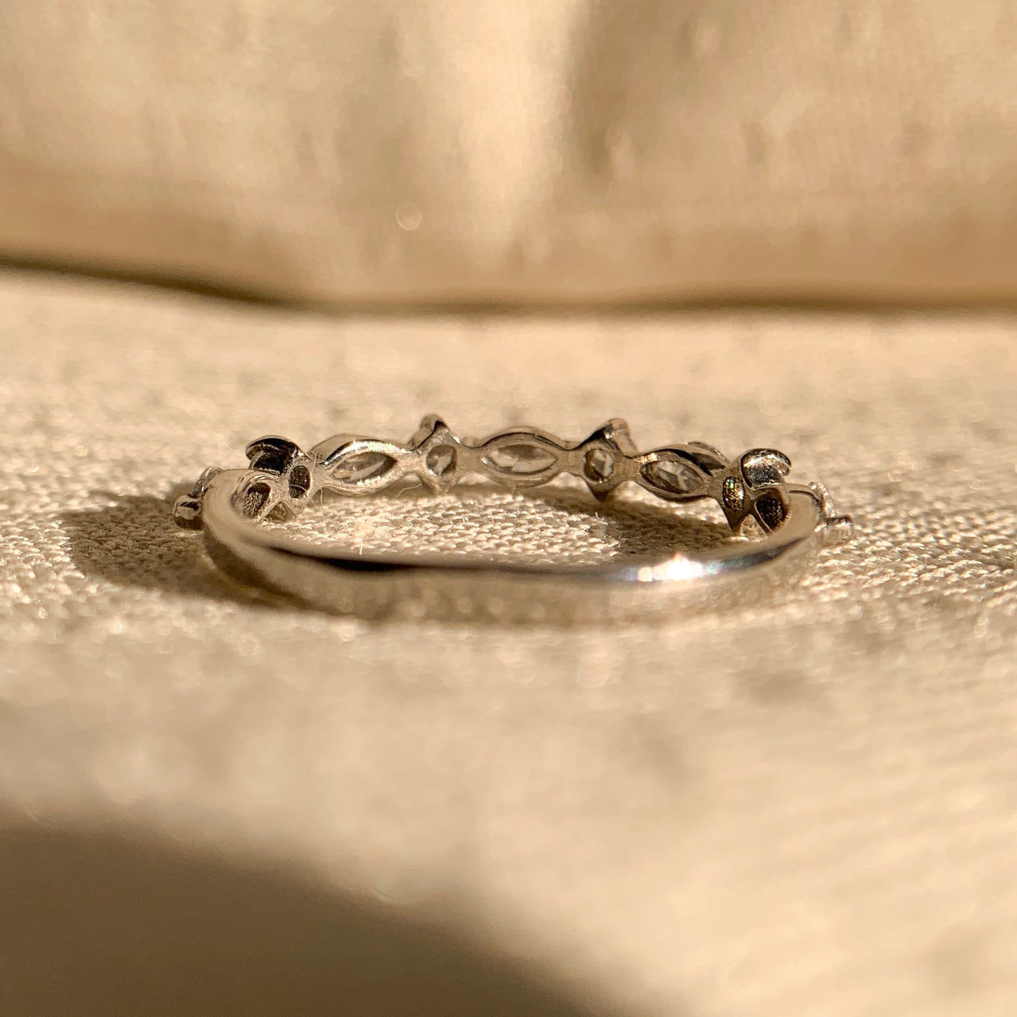Elegant horizontal marquise and round cut diamond engagement ring