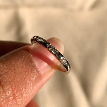 Classic 14k gold wedding band with round brilliant diamonds