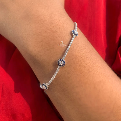 Elegant sapphire and diamond tennis bracelet in white gold