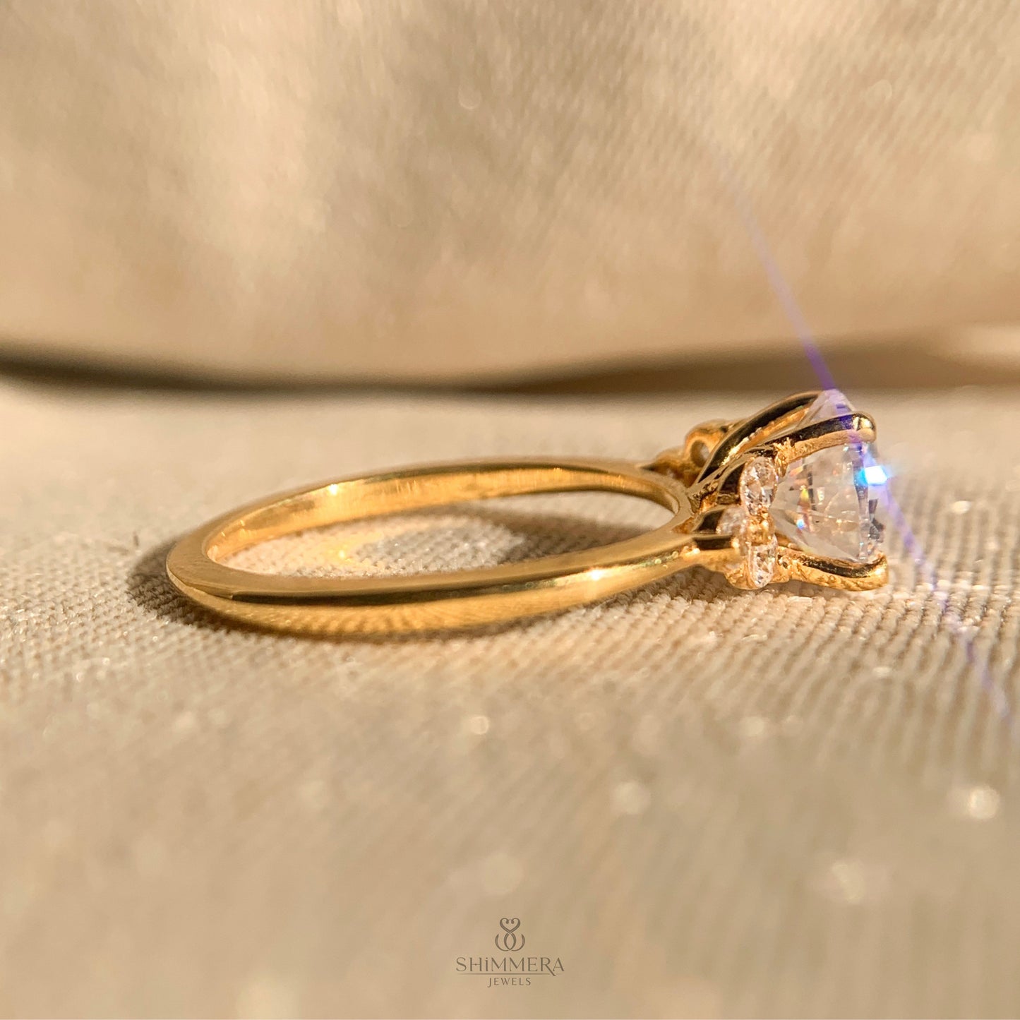 Luxury round cut diamond ring with side stone detailing