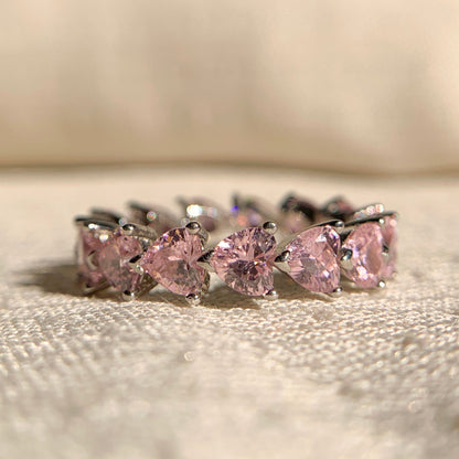 Pink diamond eternity band in heart shape design, set in fine gold