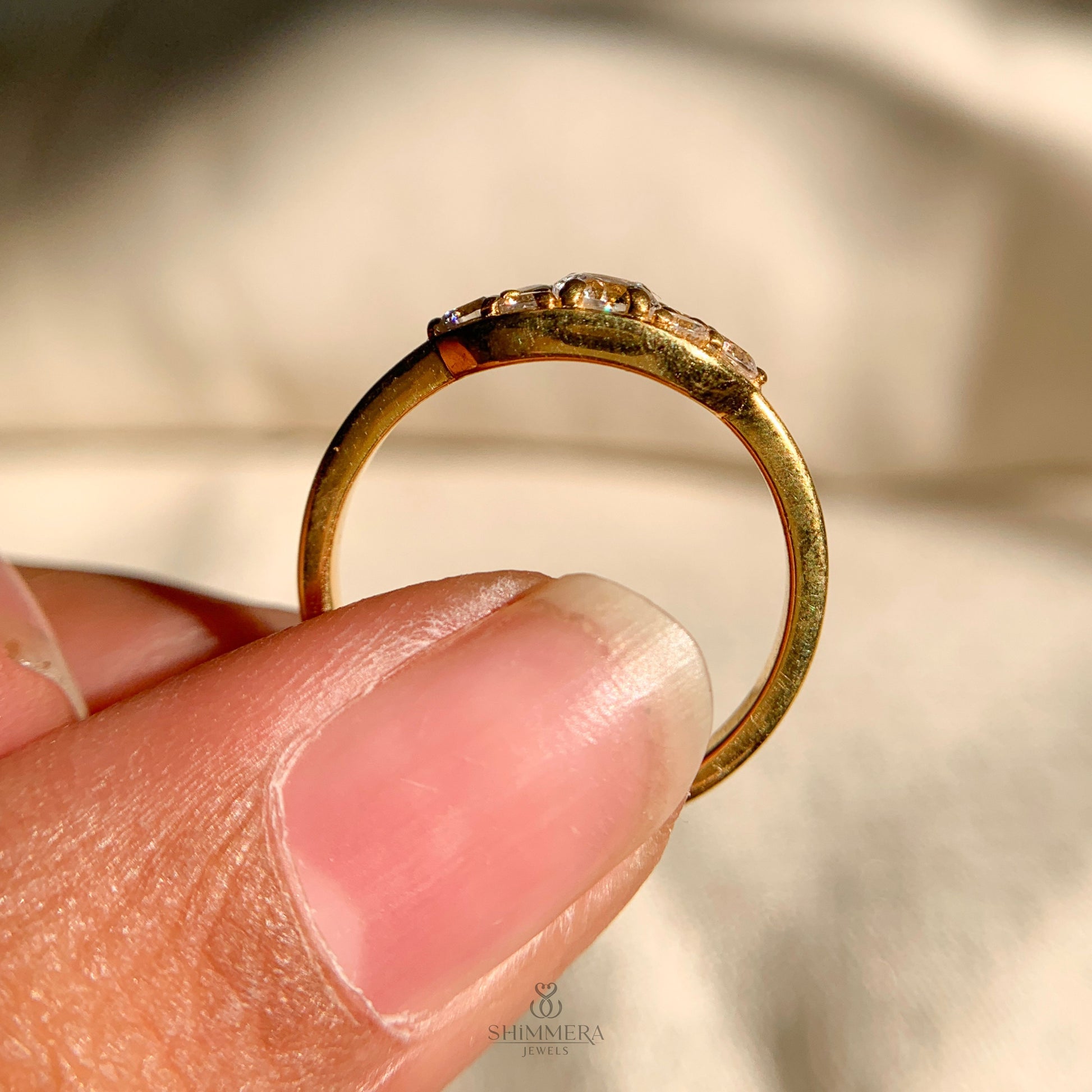 Round cluster diamond ring with moissanite stones in gold setting