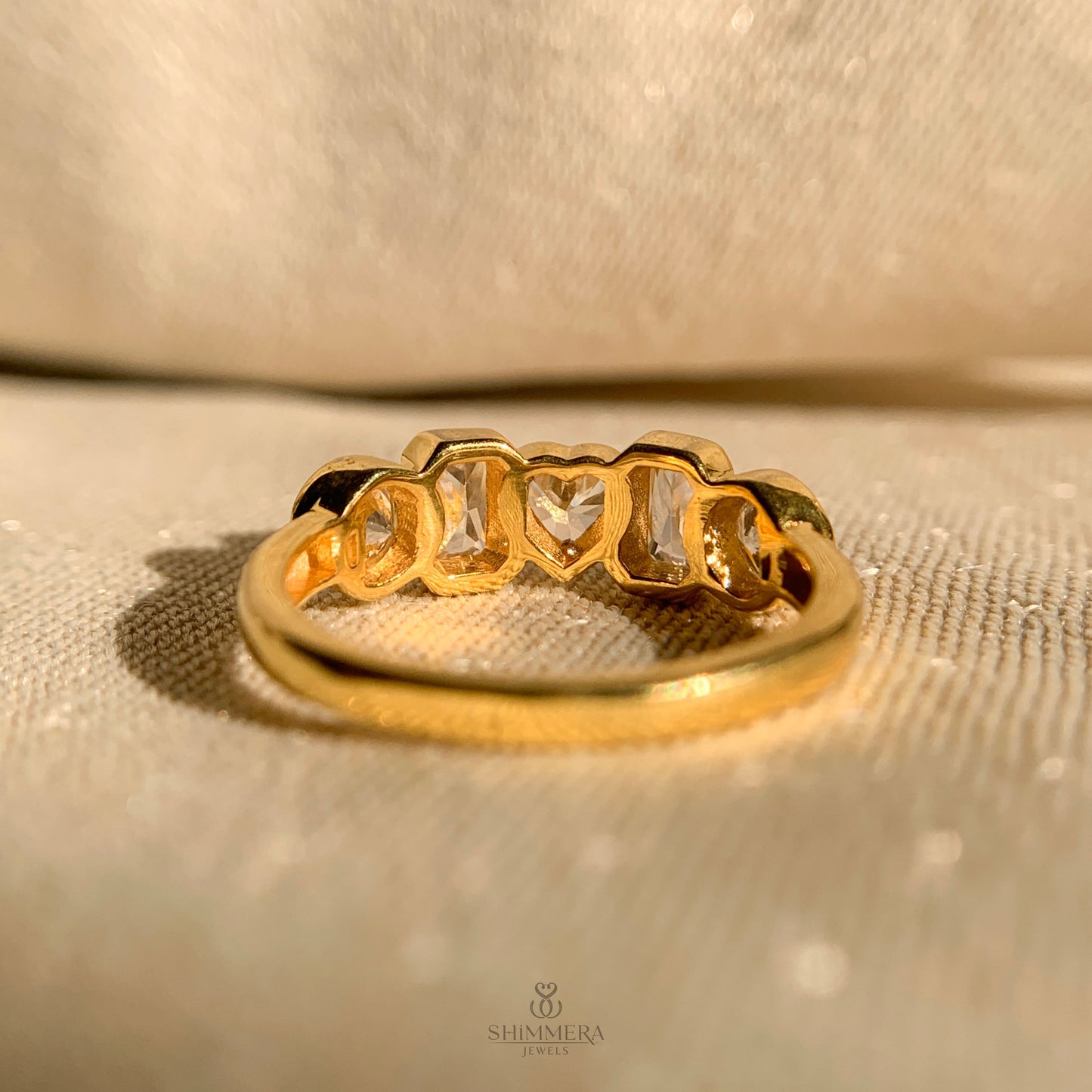 Elegant bezel set diamond eternity band with mixed shapes