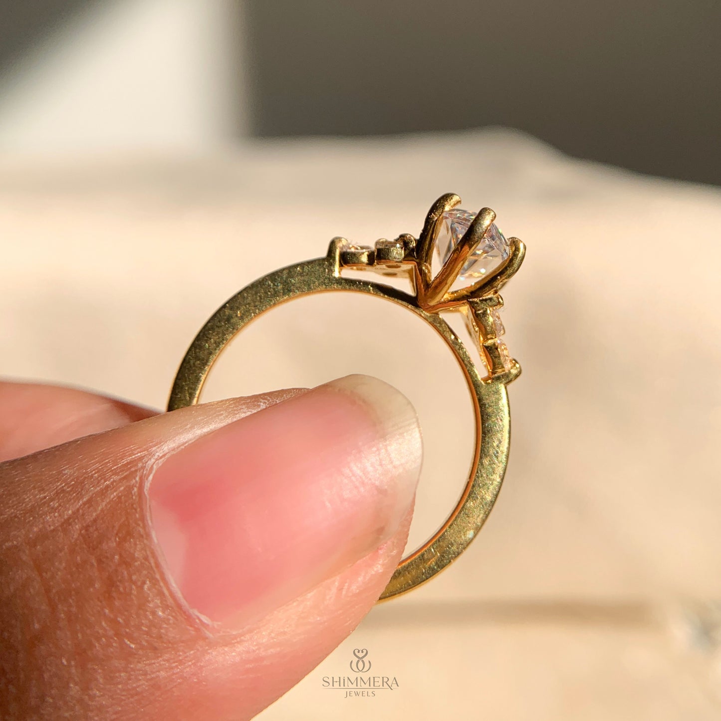 Marquise Engagement Ring With Round Side Stones
