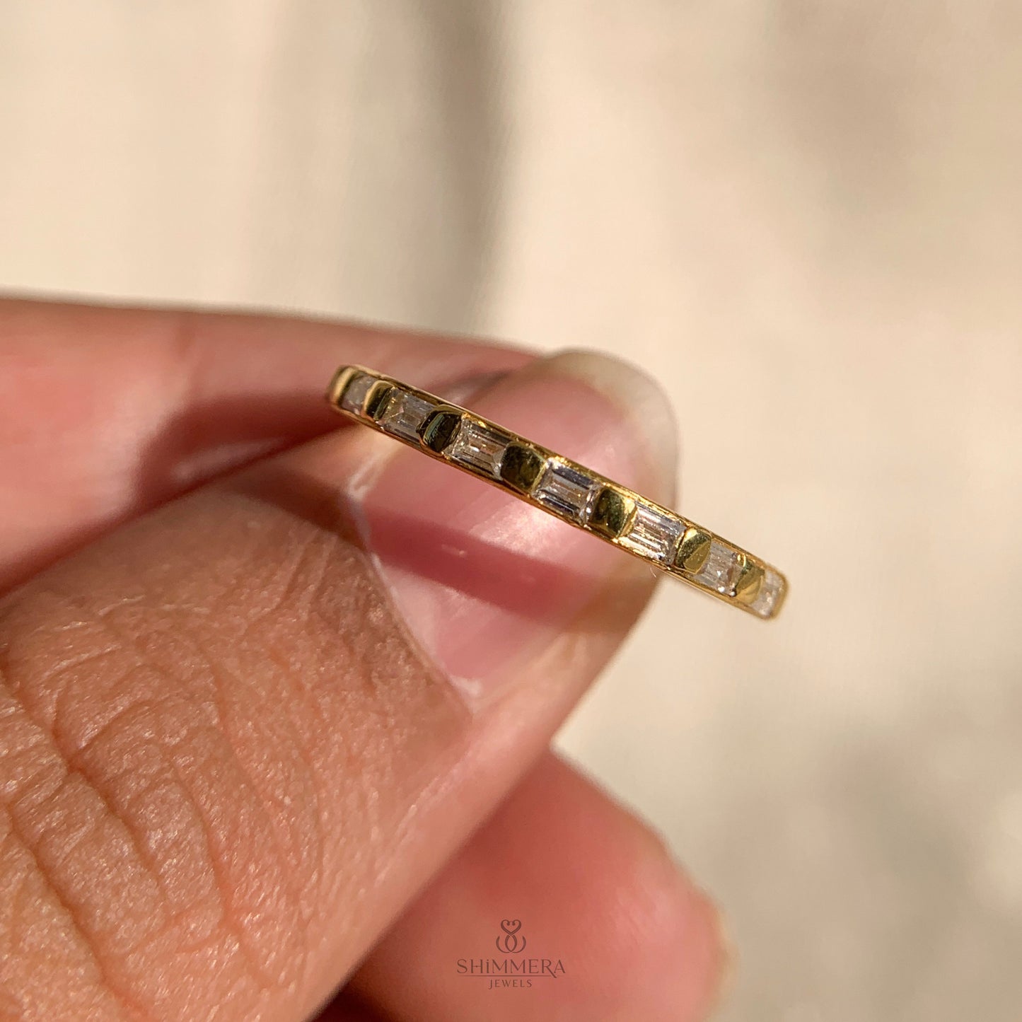 Dainty 14k gold baguette diamond wedding band for everyday wear