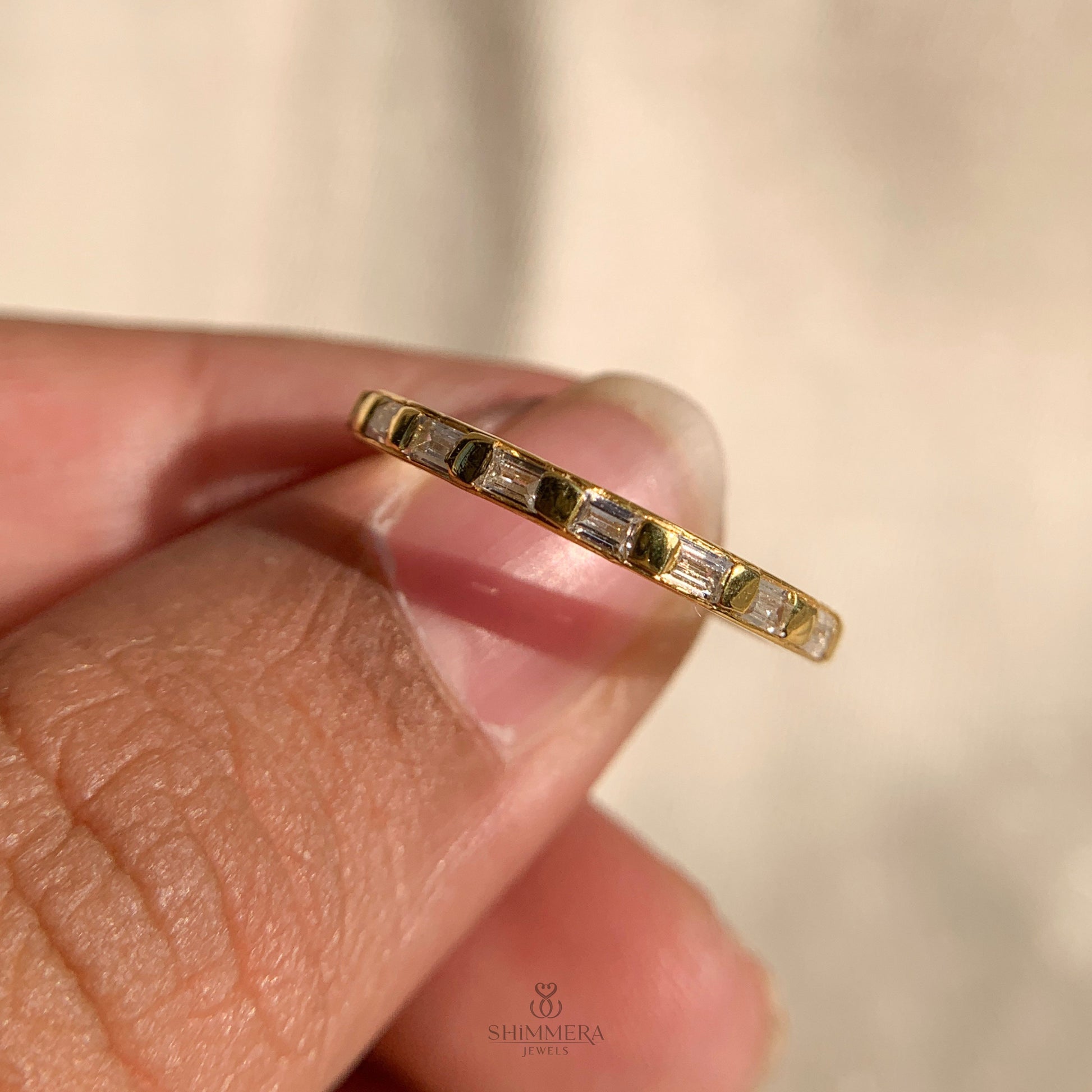 Dainty 14k gold baguette diamond wedding band for everyday wear
