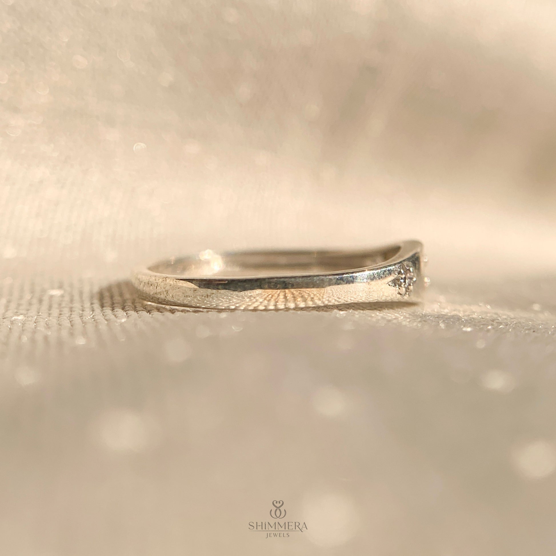 Dainty starburst diamond ring crafted in 14k white gold