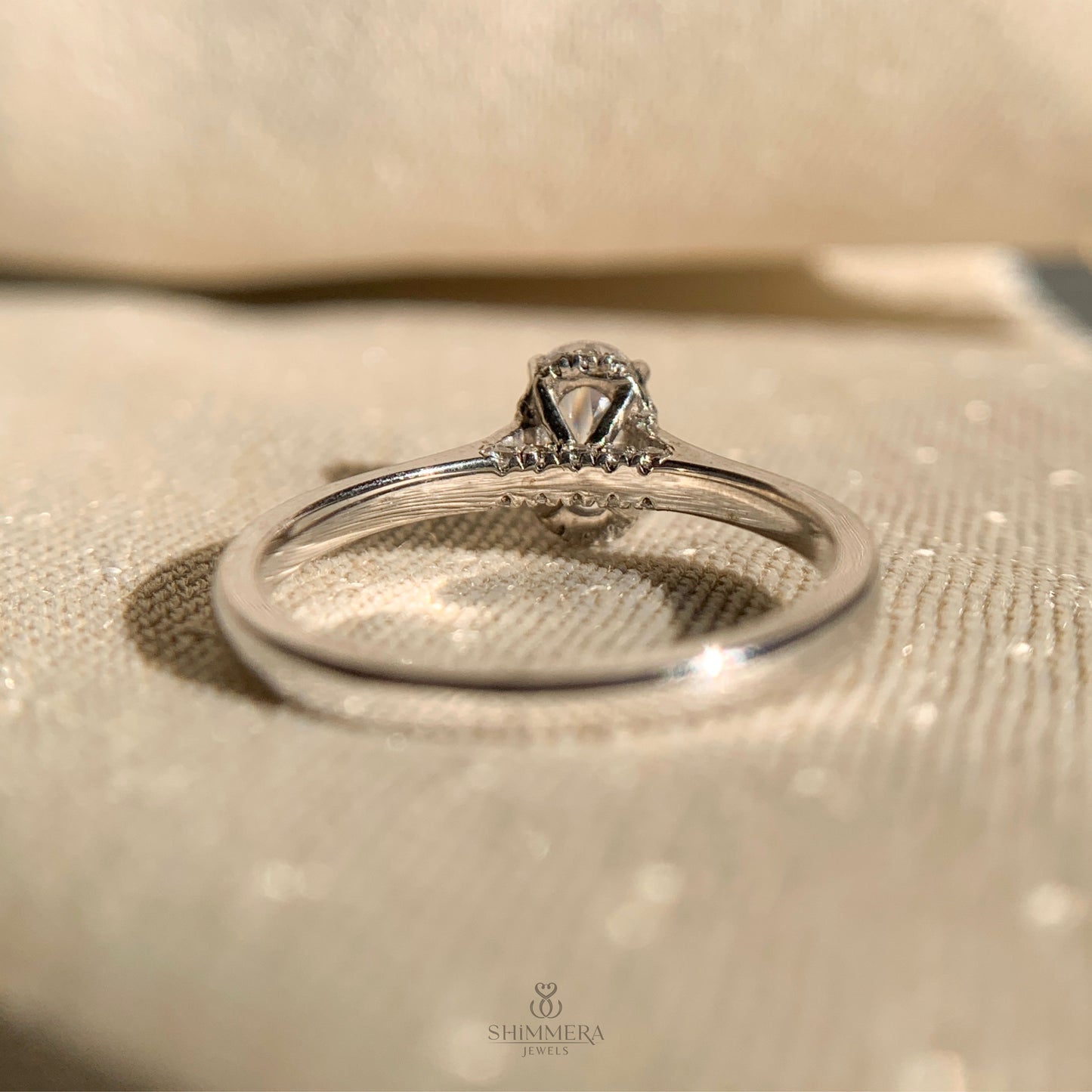 Classic 14k white gold solitaire engagement ring with oval diamond