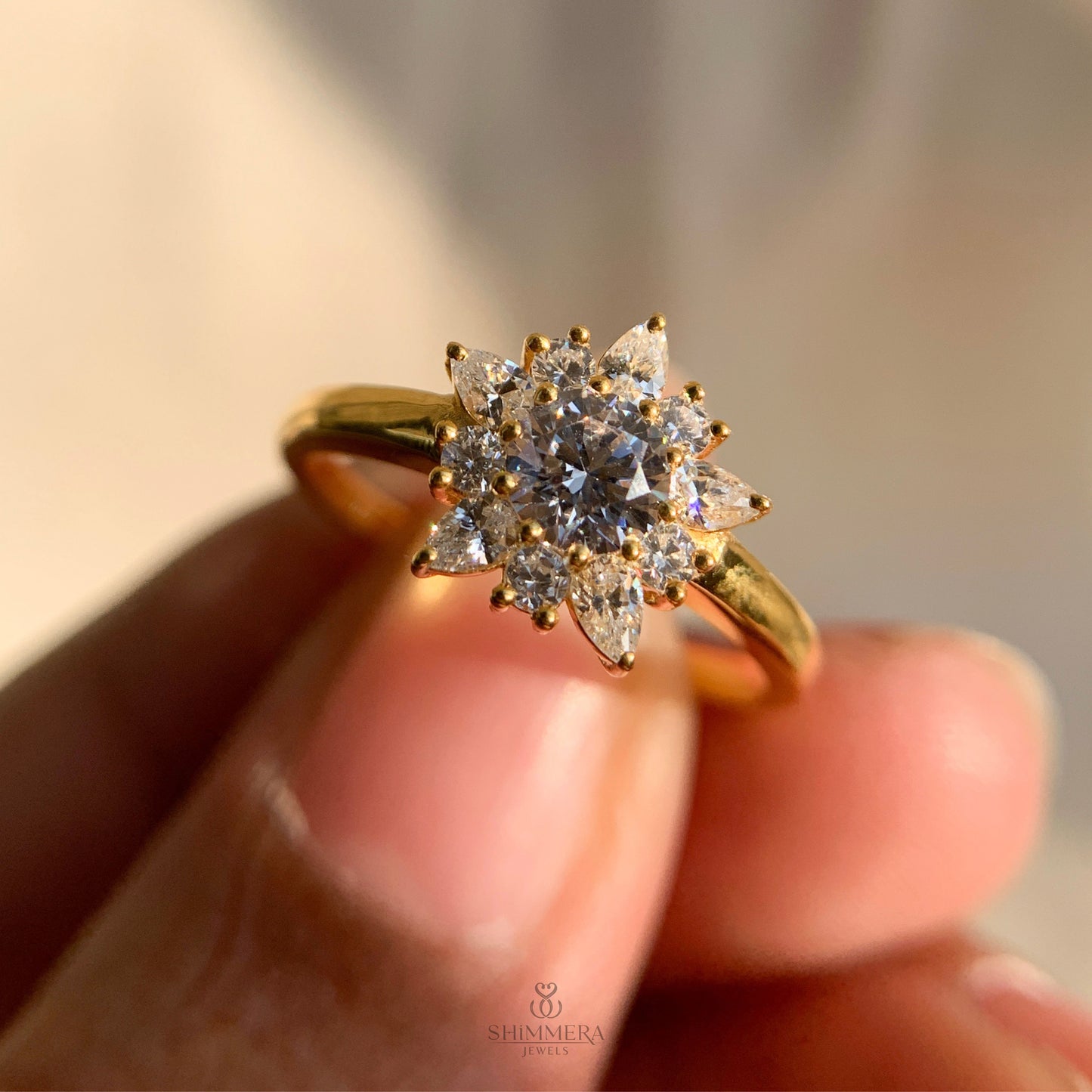 Sparkling round and pear cut diamond cluster ring for brides