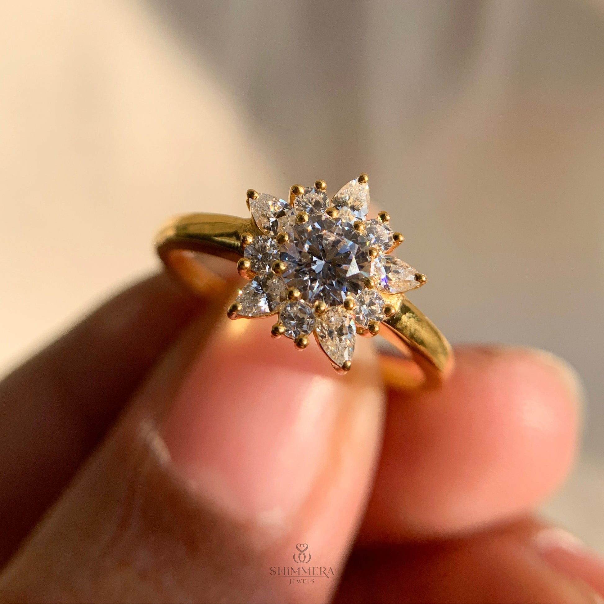 Sparkling round and pear cut diamond cluster ring for brides
