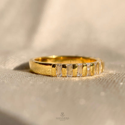 Unique moissanite baguette wedding ring in yellow gold