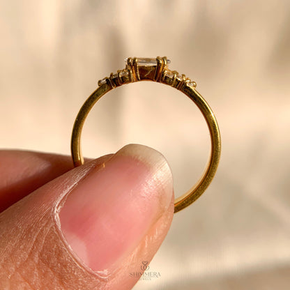 Luxury diamond engagement ring with marquise cut side stones