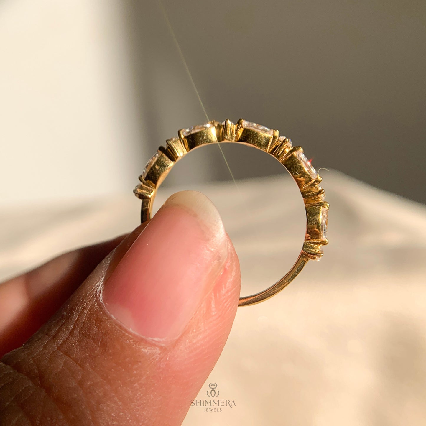 Modern marquise and round diamond half eternity wedding band