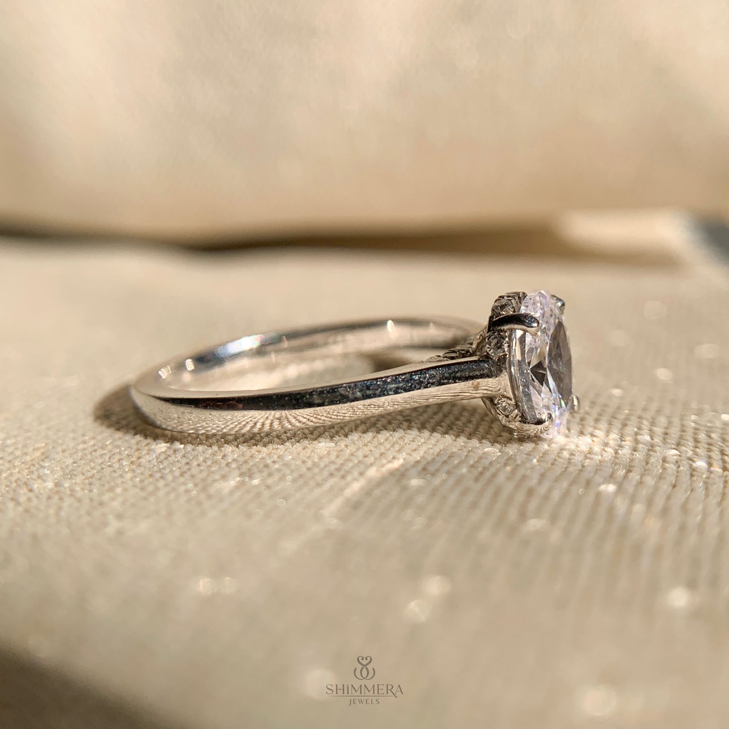 Timeless oval cut diamond ring in 14k white gold solitaire setting