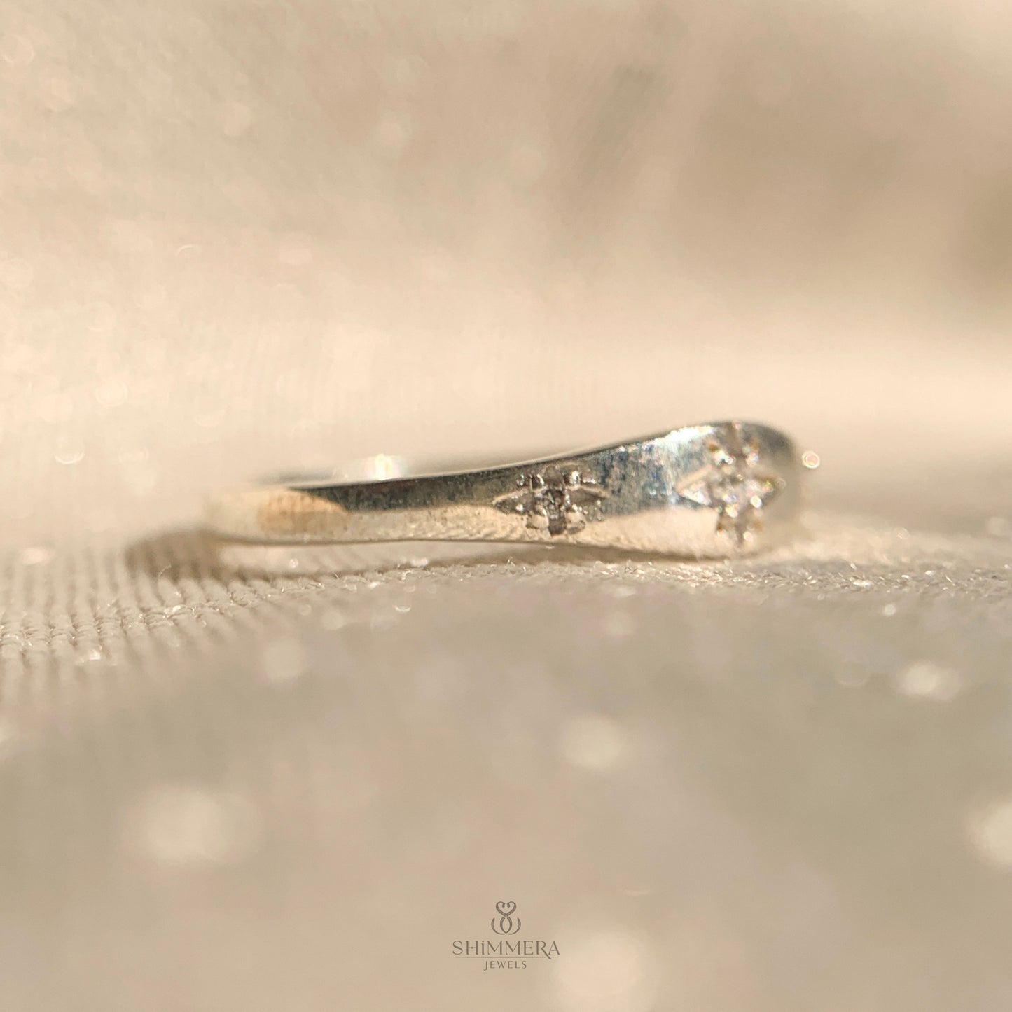 Celestial-inspired starburst ring in polished 14k white gold