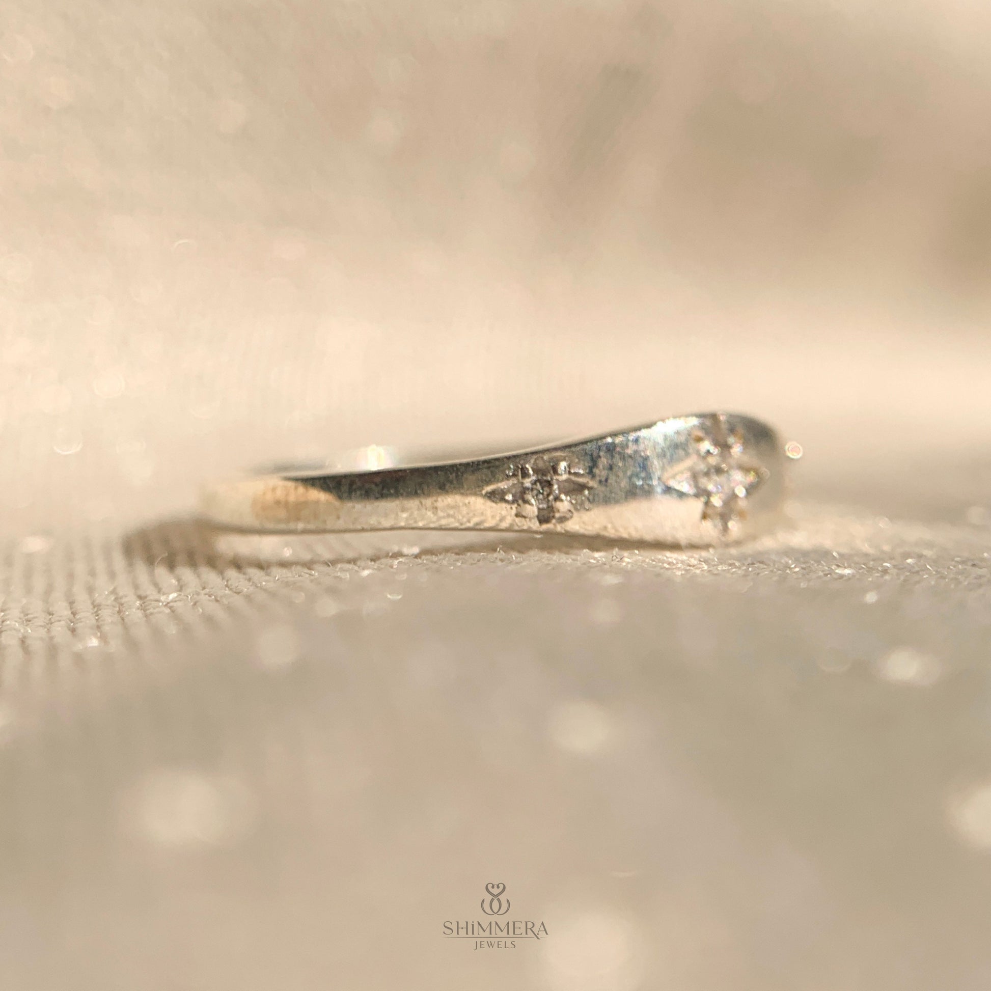 Celestial-inspired starburst ring in polished 14k white gold