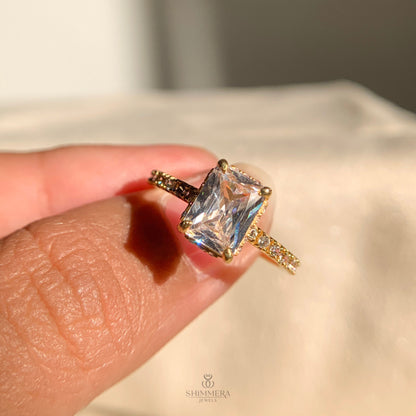 Hidden halo radiant moissanite engagement ring in platinum finish