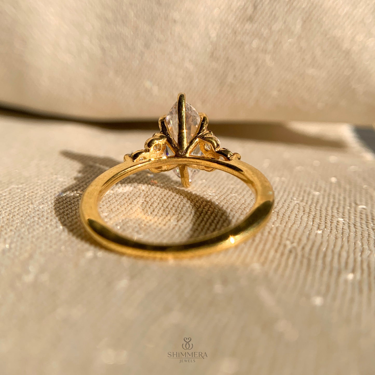 Marquise Engagement Ring With Round Side Stones