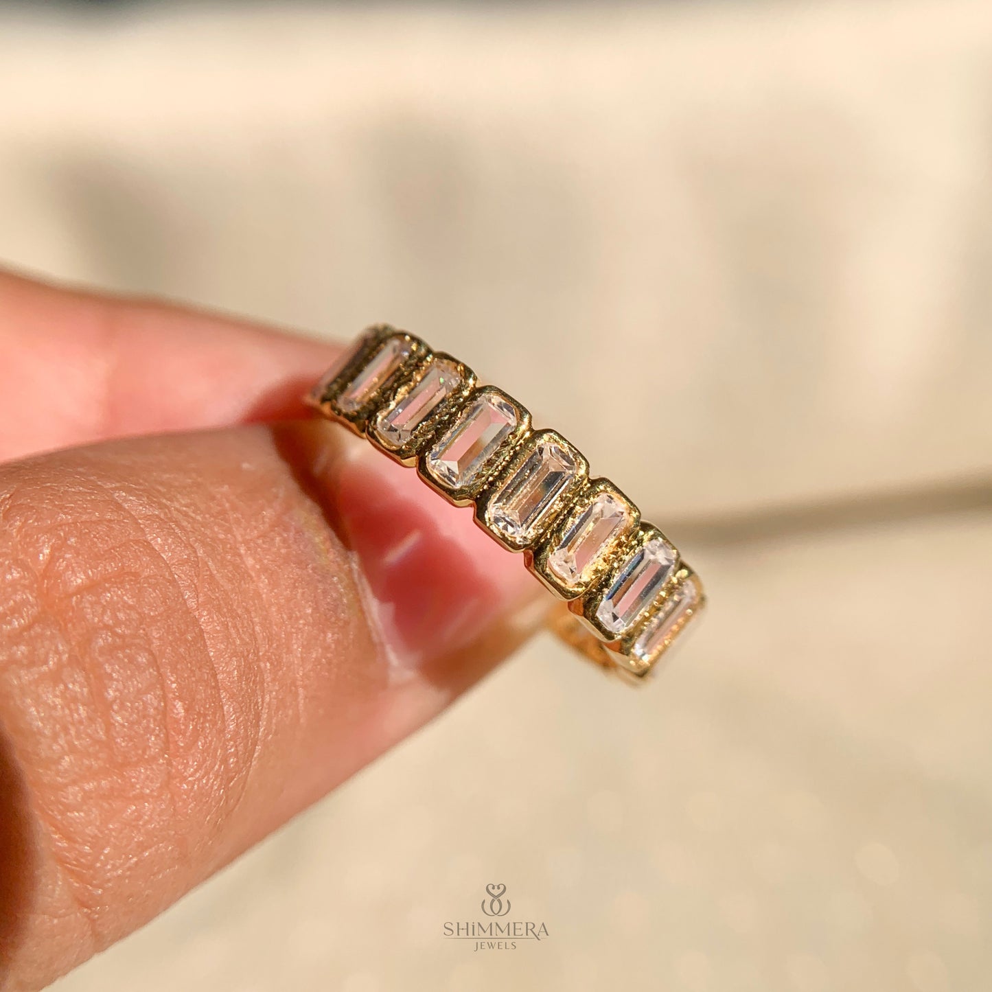 Green Emerald and Emerald Cut Eternity Band