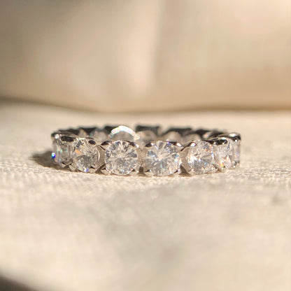 Lab grown round diamond eternity band in polished white gold setting