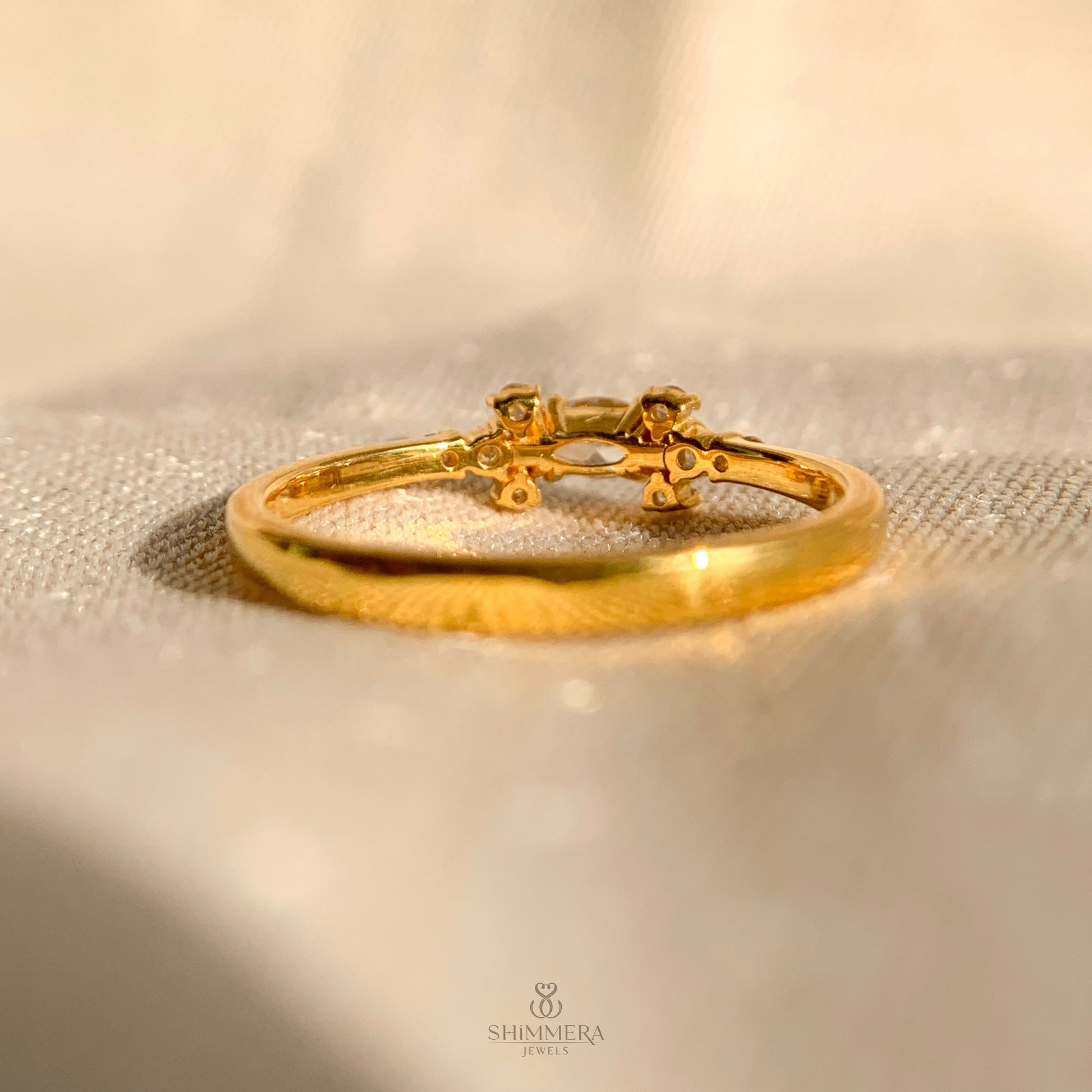 Timeless engagement ring design with marquise side stone details