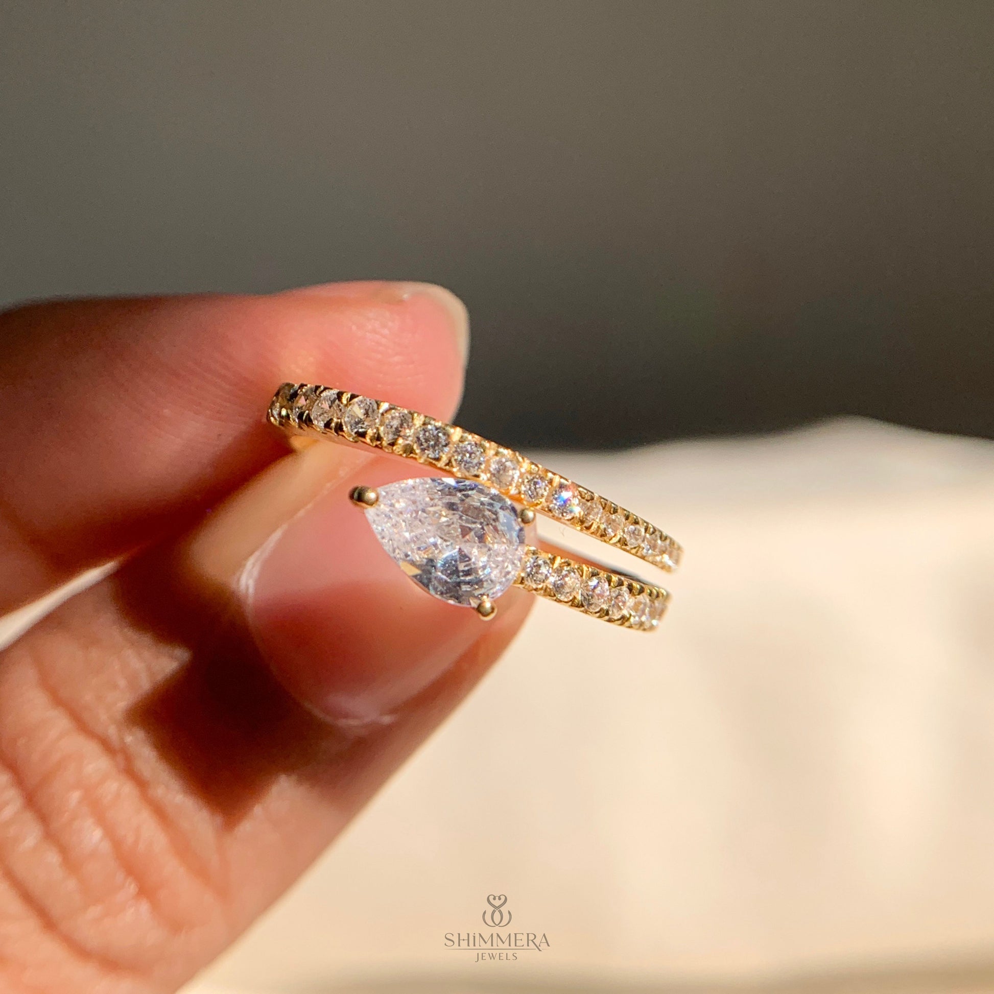 Modern pear cut lab diamond anniversary ring for women