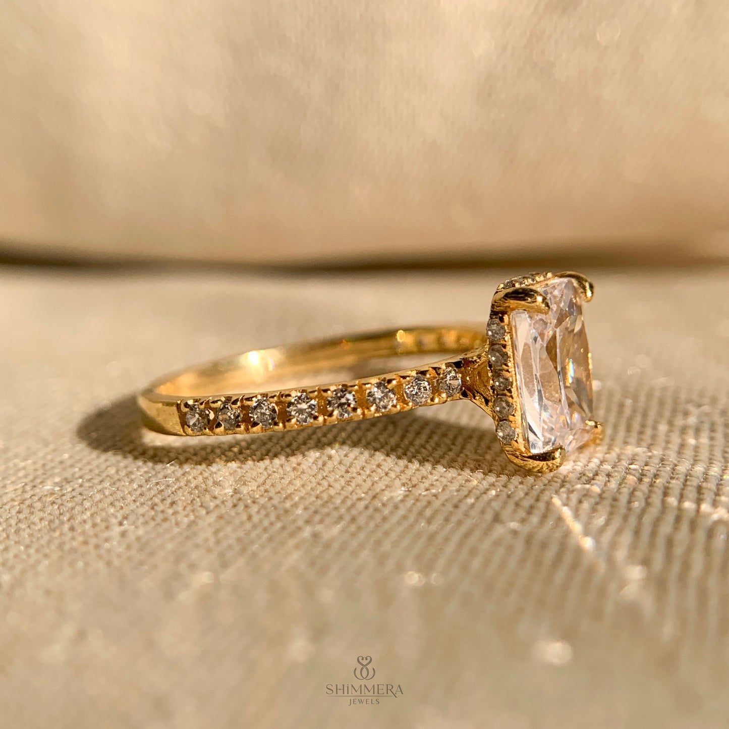 Timeless radiant cut moissanite ring with under-halo diamond detail