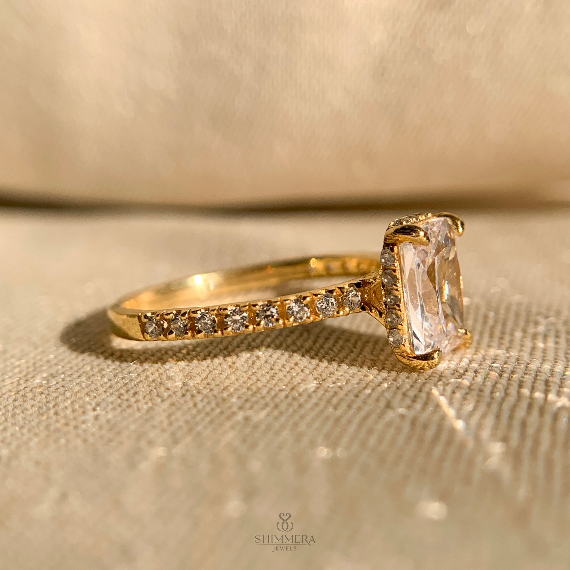 Timeless radiant cut moissanite ring with under-halo diamond detail