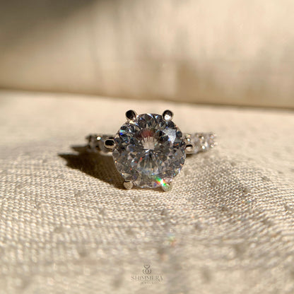 Classic solitaire engagement ring featuring Old European cut diamond