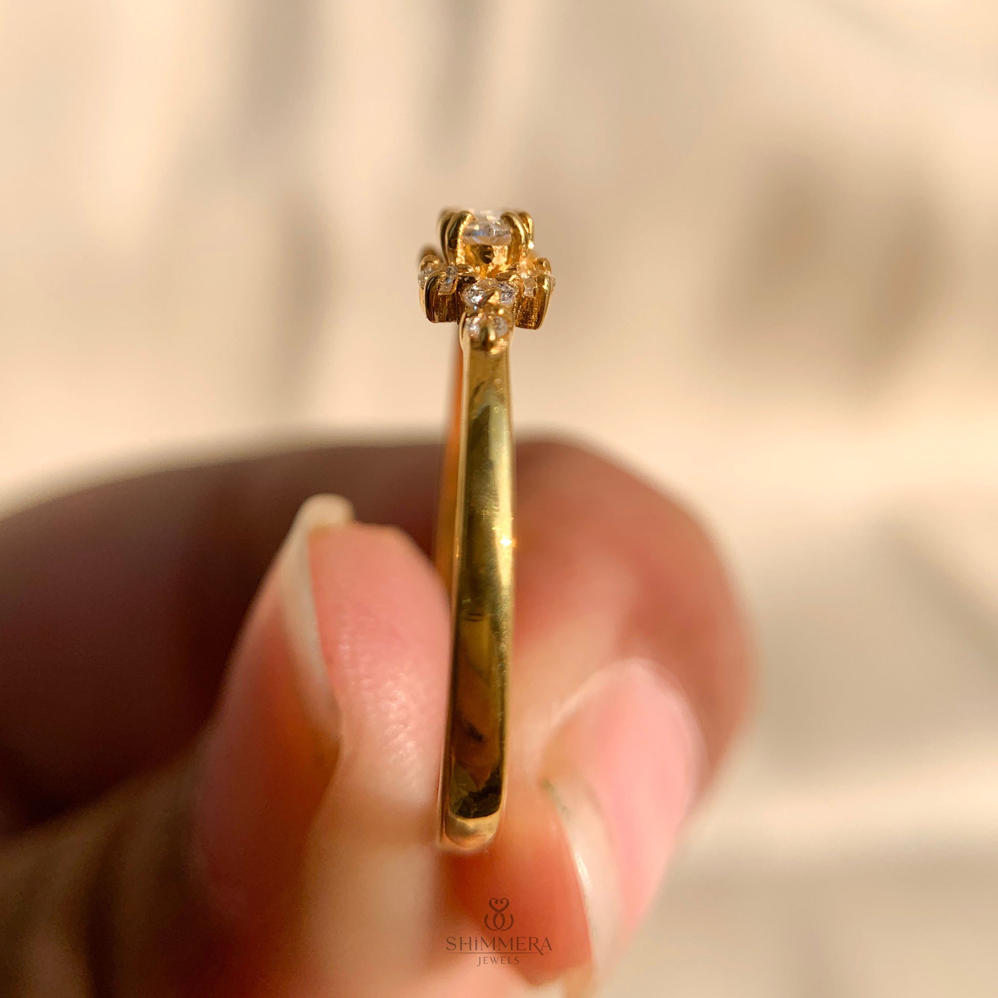 Dainty engagement ring with marquise side stones for women