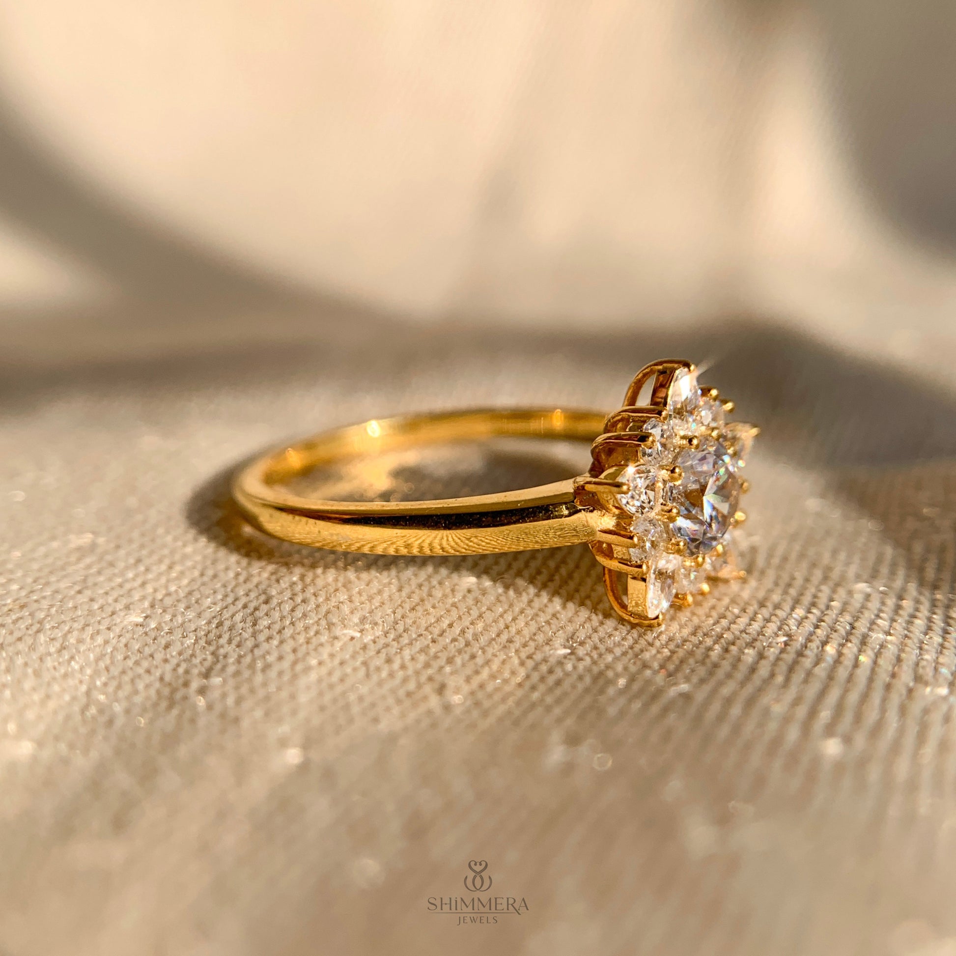 Luxury white gold round and pear diamond cluster engagement ring