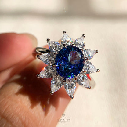 Oval Cut Engagement Rings with Blue Sapphires and White Pear
