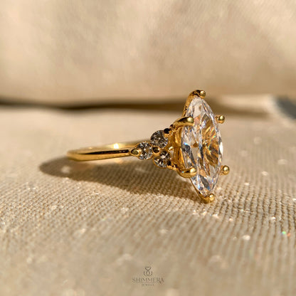 Marquise Engagement Ring With Round Side Stones