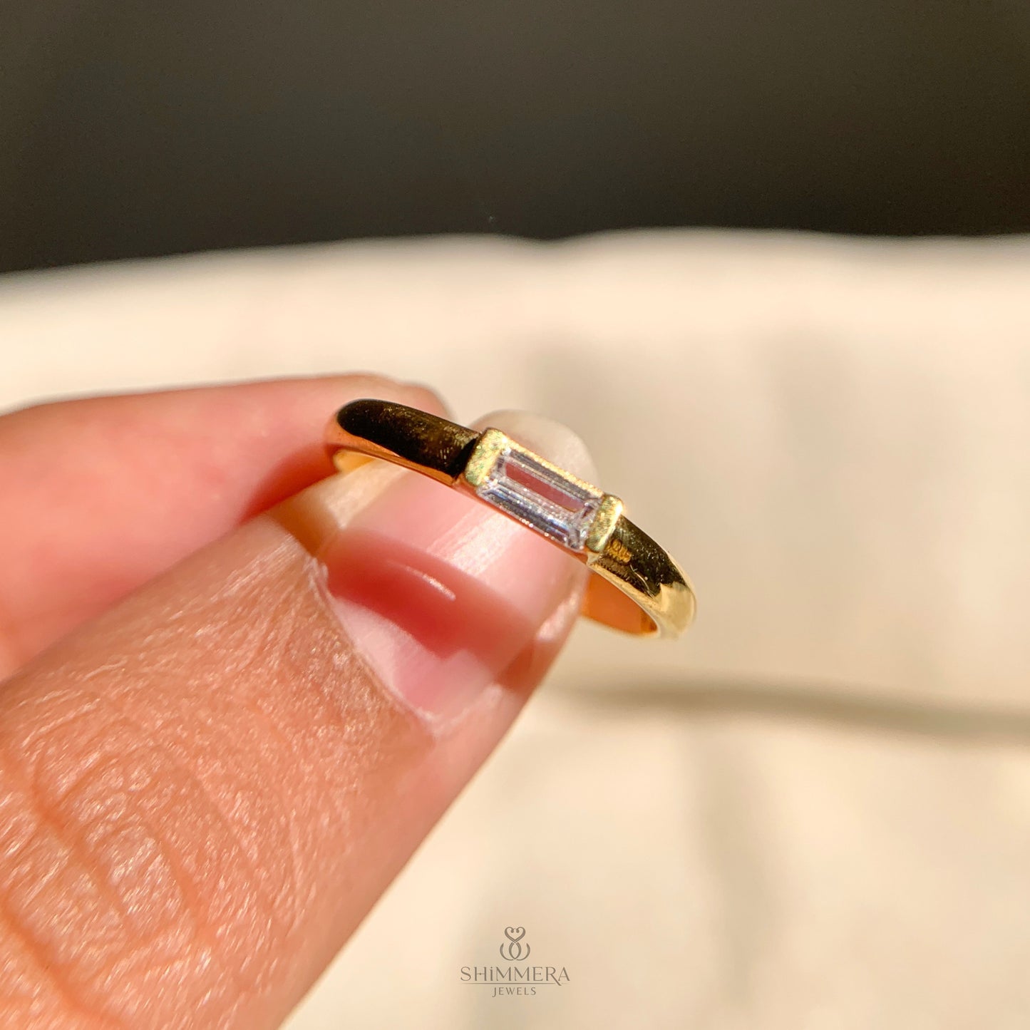 Timeless east-west baguette diamond wedding ring with polished finish