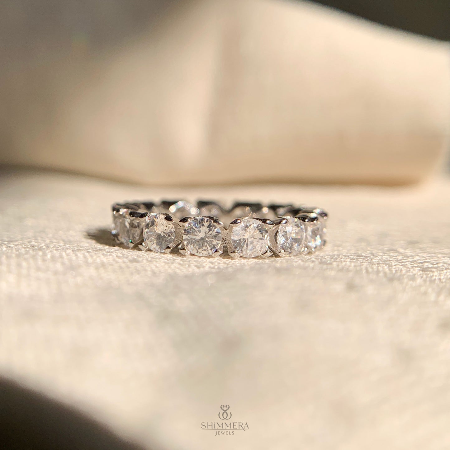Lab made round diamond wedding band with continuous sparkle