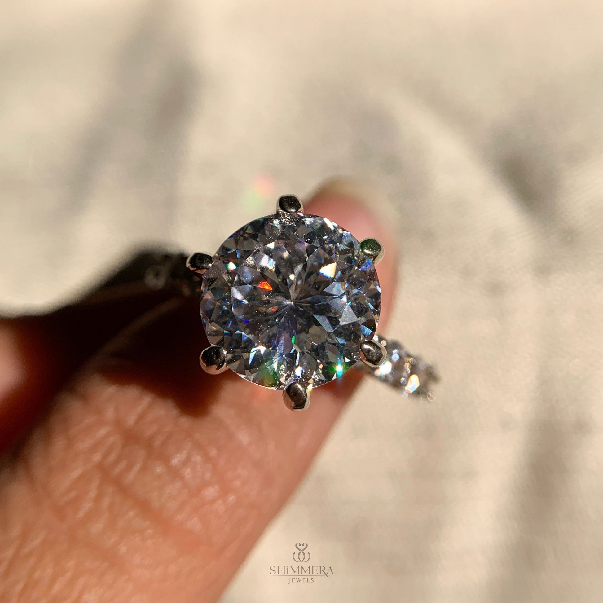 Romantic vintage engagement ring featuring Old European cut gemstone