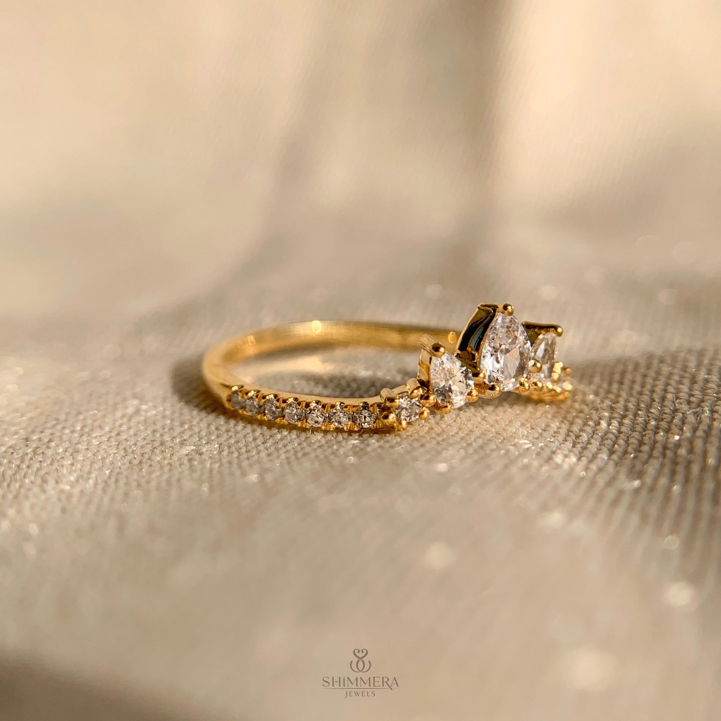 Pear And Round Curved Diamond Wedding Ring